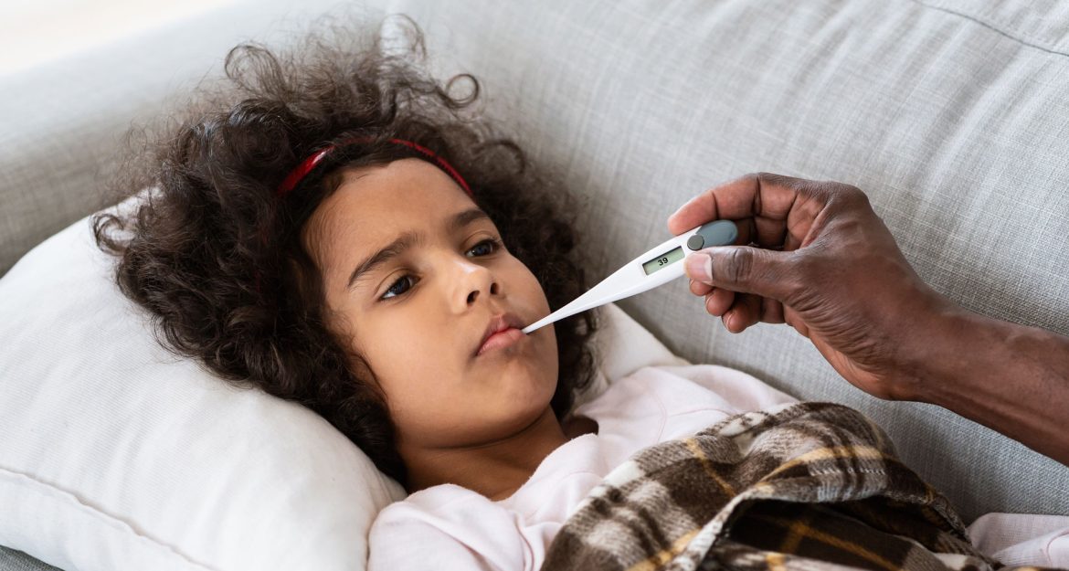 world-pandemic-sick-little-girl-with-high-fever-an-XSA2L9F.jpg